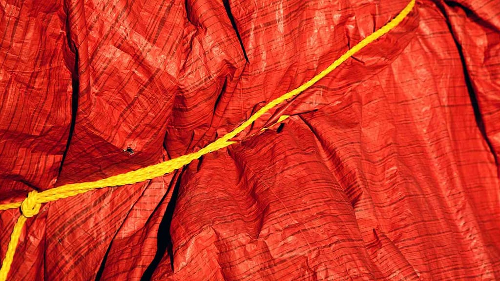 red canvas tarp with rope