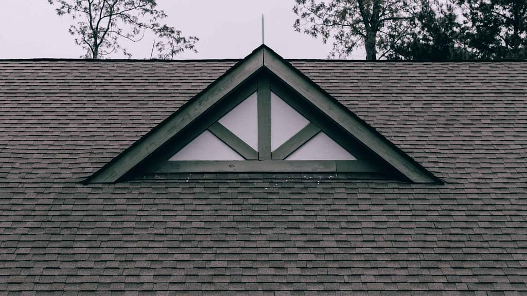 An architectural asphalt roof up close.
