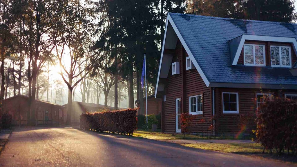 brown houses with blue roofing installed by Vermont roofing contractor