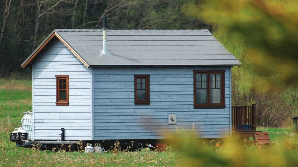 home in the field checked by Indiana roofing contractor