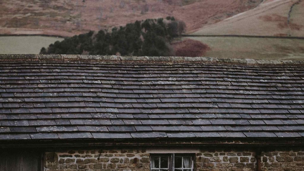 old and faded roof subjected to Nebraska new roof cost estimation