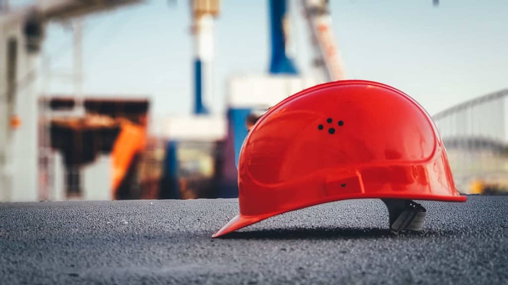 red hard hat from a skilled Nebraska roofer