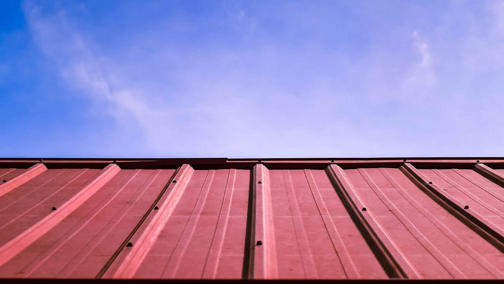 red metal roofing installed by a skilled Iowa roofer