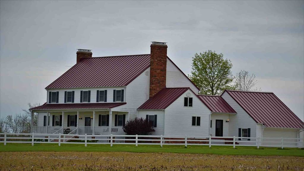 home with red roofs and chimneys scanned by Idaho roofing calculator