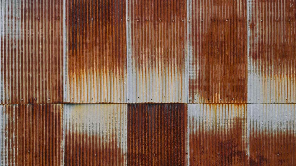 faded and rusted roofing metal sheets