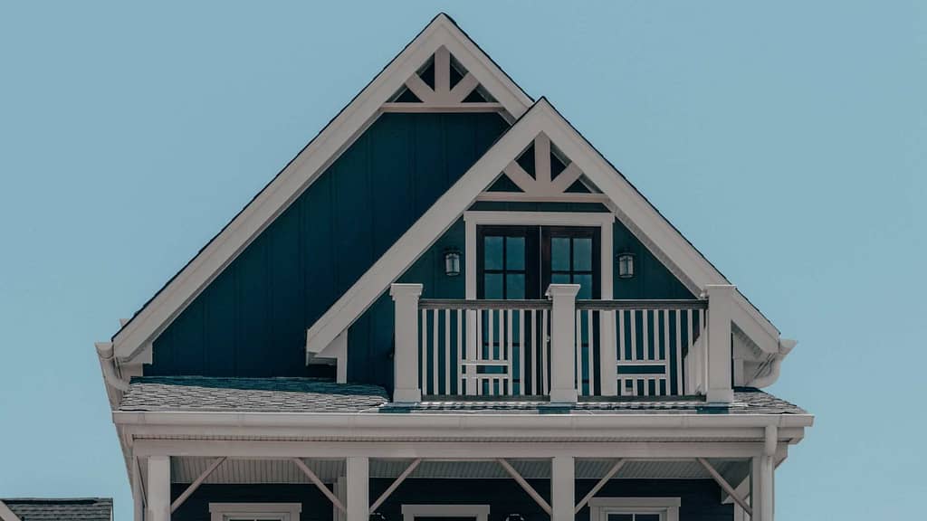 white and teal home scanned via West Virginia roofing calculator