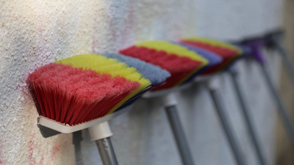 colorful brooms