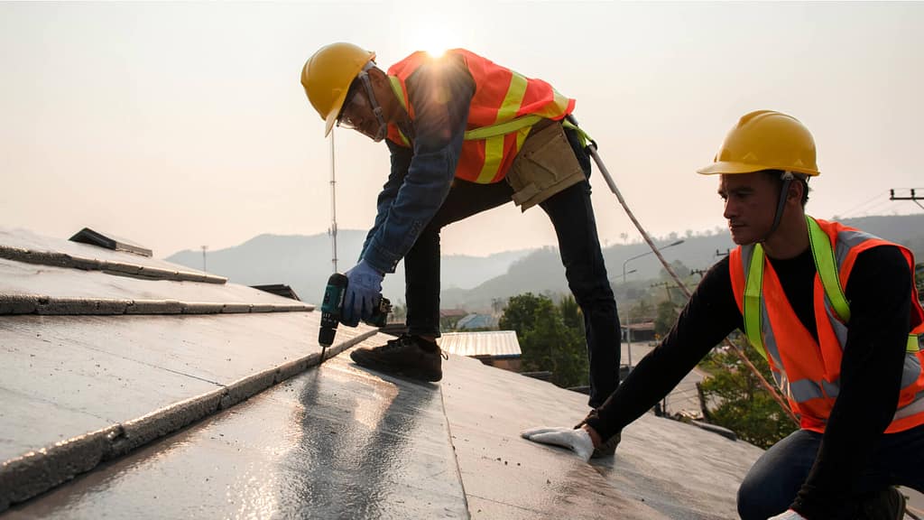 professional roofers working on a roof