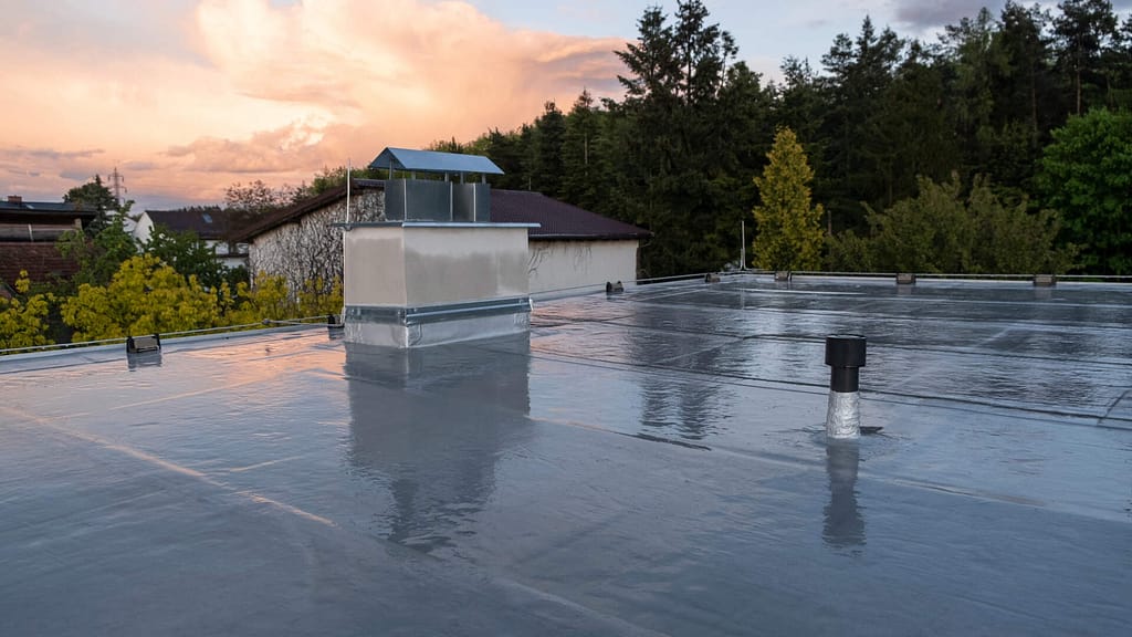 house with a modified bitumen flat roof