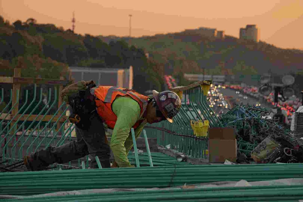 man working with ppe from Louisiana roofing contractor