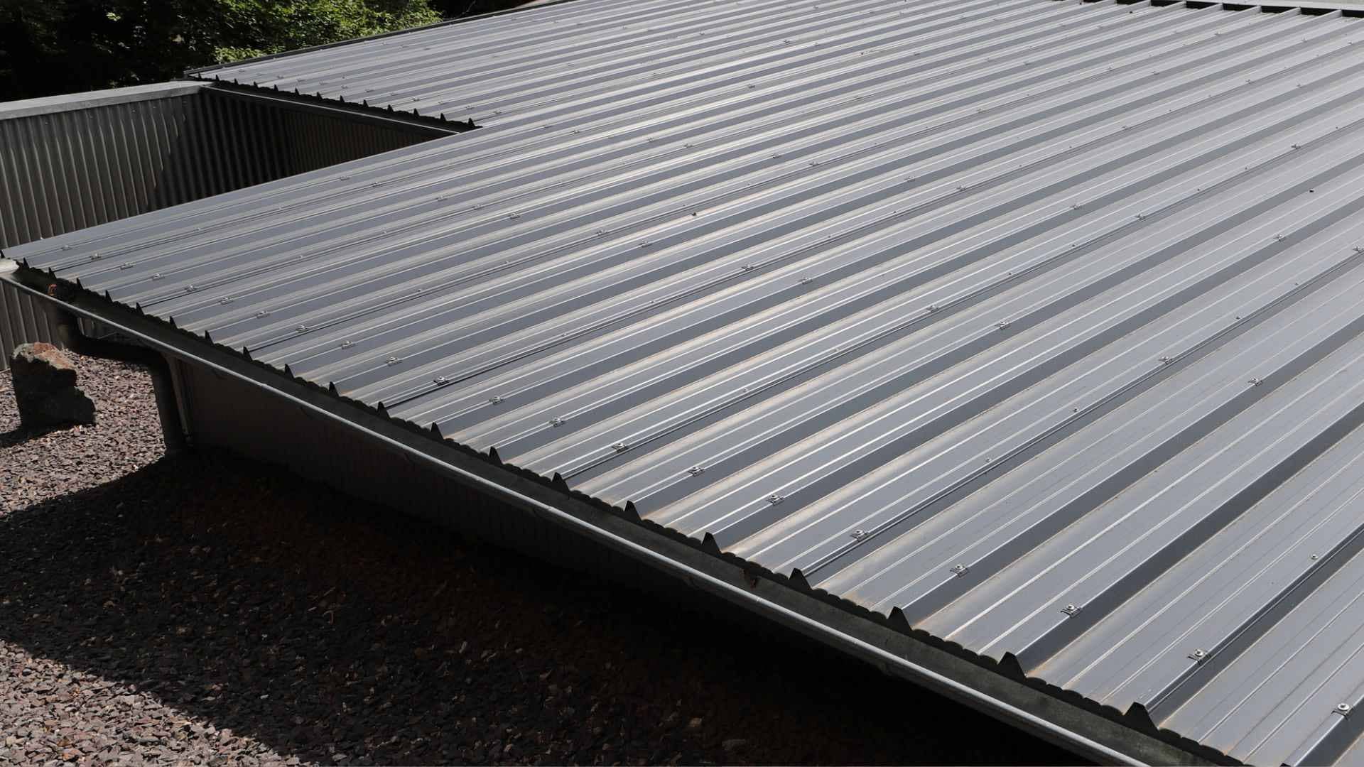 top down view of a flat roof made of standing seam metal