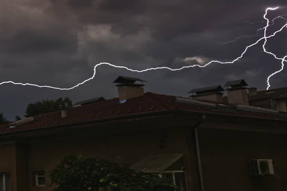 Lightning on top of a roof