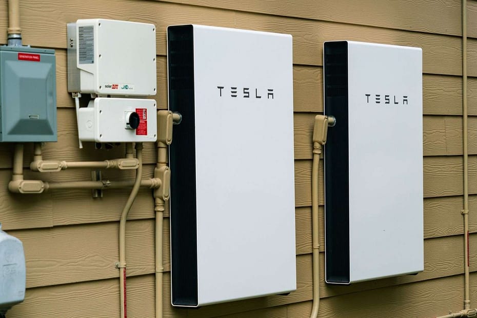 tesla powerwall affixed to side of house