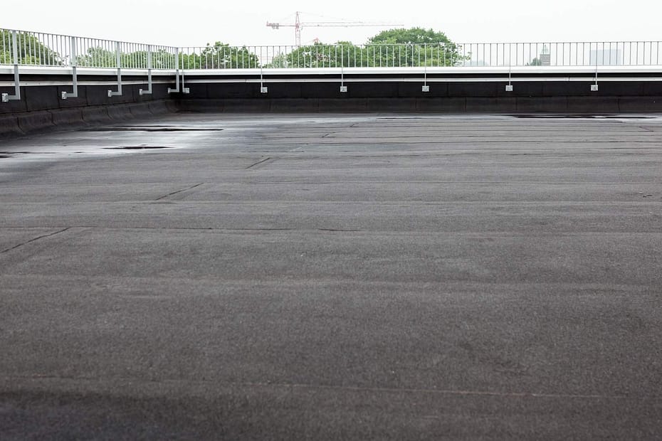 flat roof with light pooling after a storm