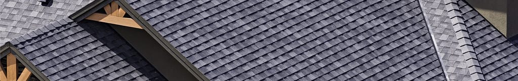 bird's eye view shot of a large and complicated asphalt roof