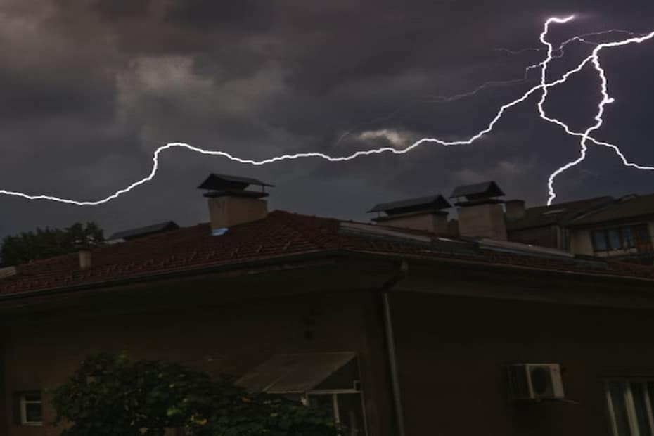 Lightning on top of a roof