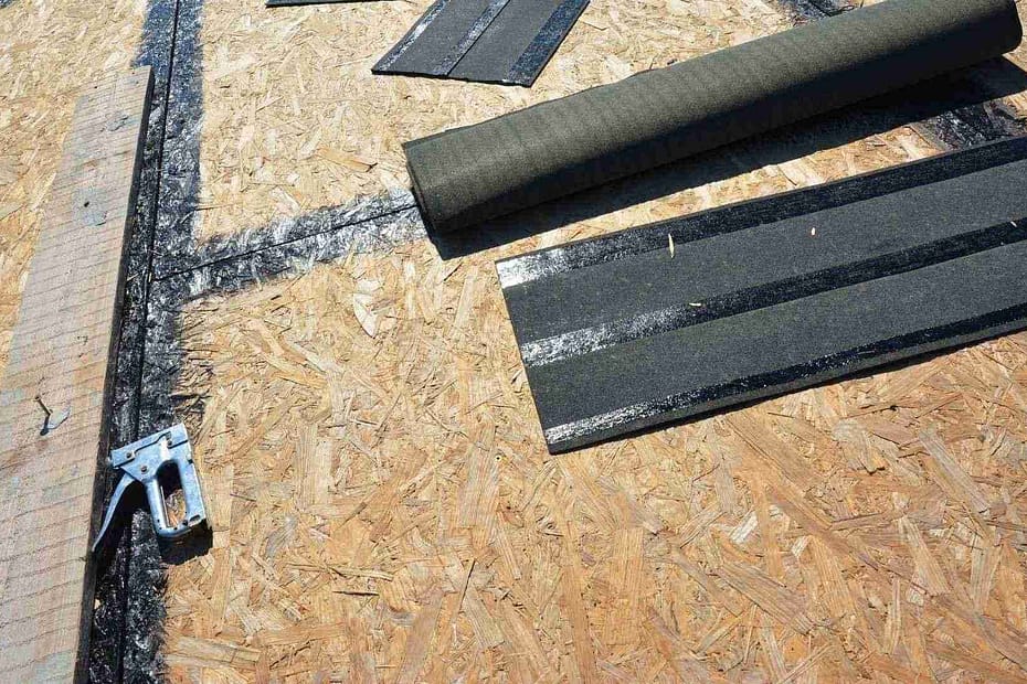 decking laid on roof with tar sealing the seams