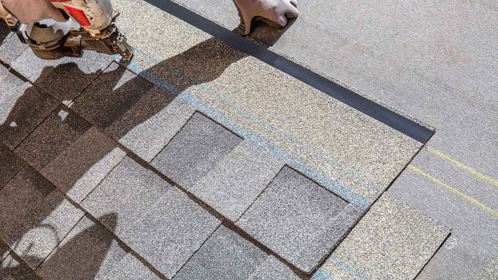 Architectural Shingles being installed by roofer