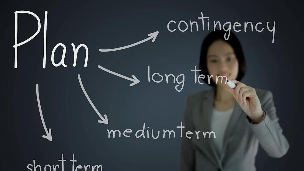 woman writing a plan