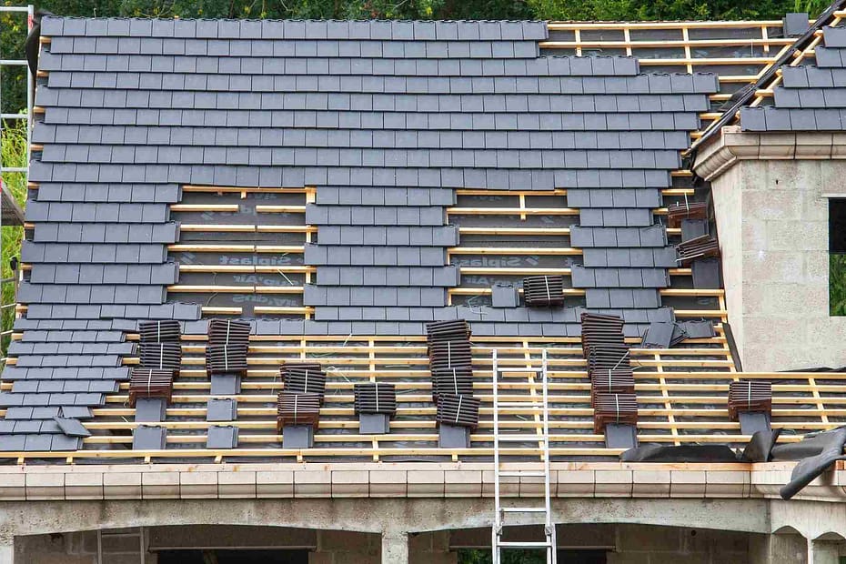 slate roof being replaced