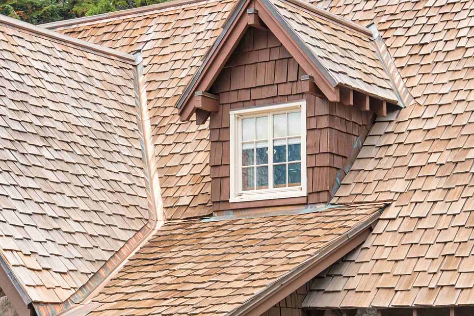 well maintained cedar shake roof on house